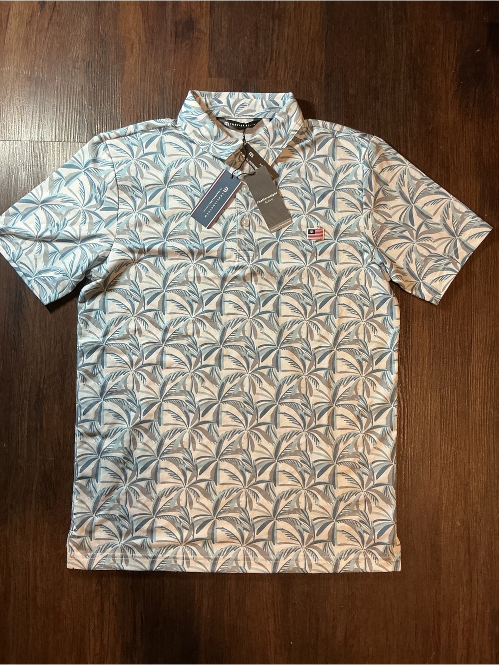 Travis Mathew Featherweight Parade Polo R,W, & B collection NWT Small